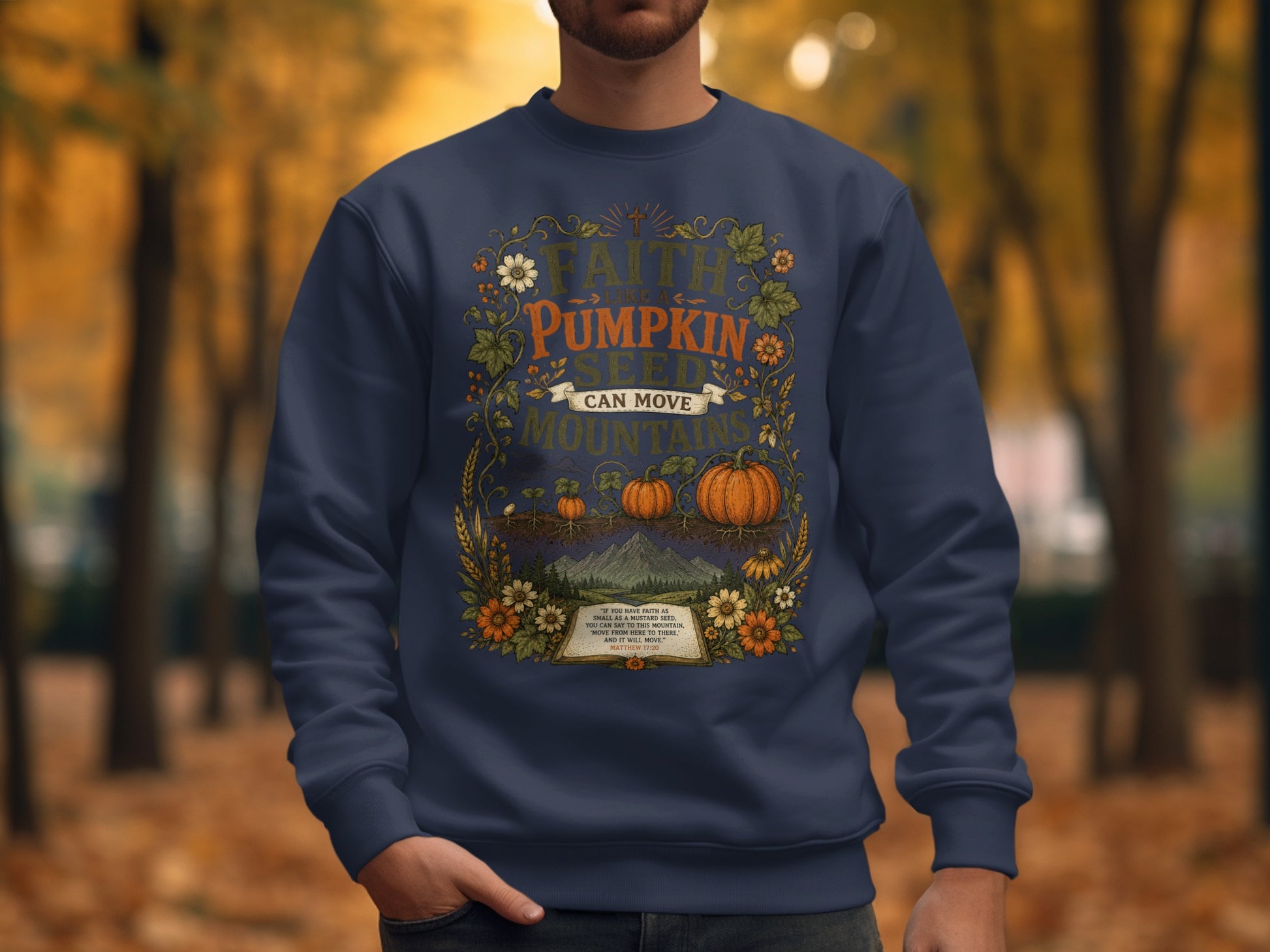 Navy sweatshirt with "Faith Like a Pumpkin Seed Can Move Mountains" design.