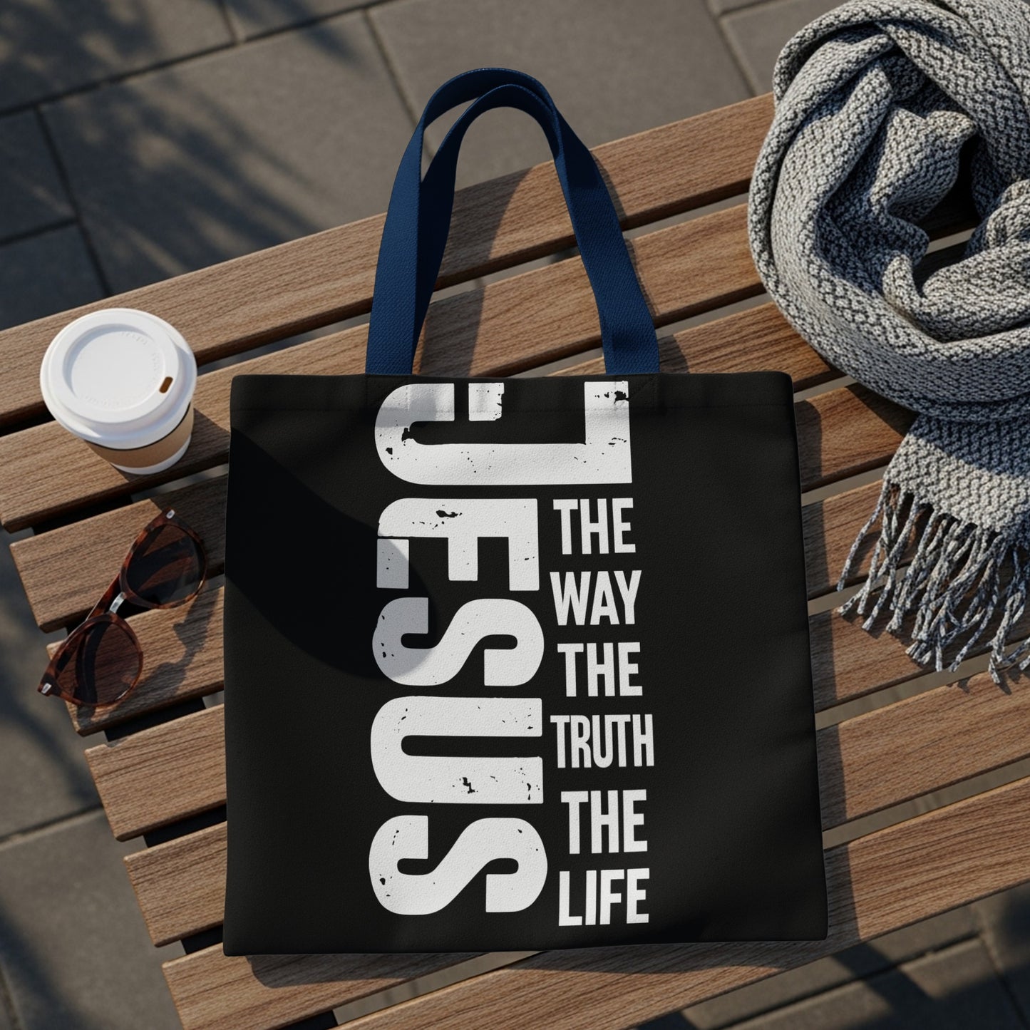 Black tote bag with white text "JESUS THE WAY THE TRUTH THE LIFE".