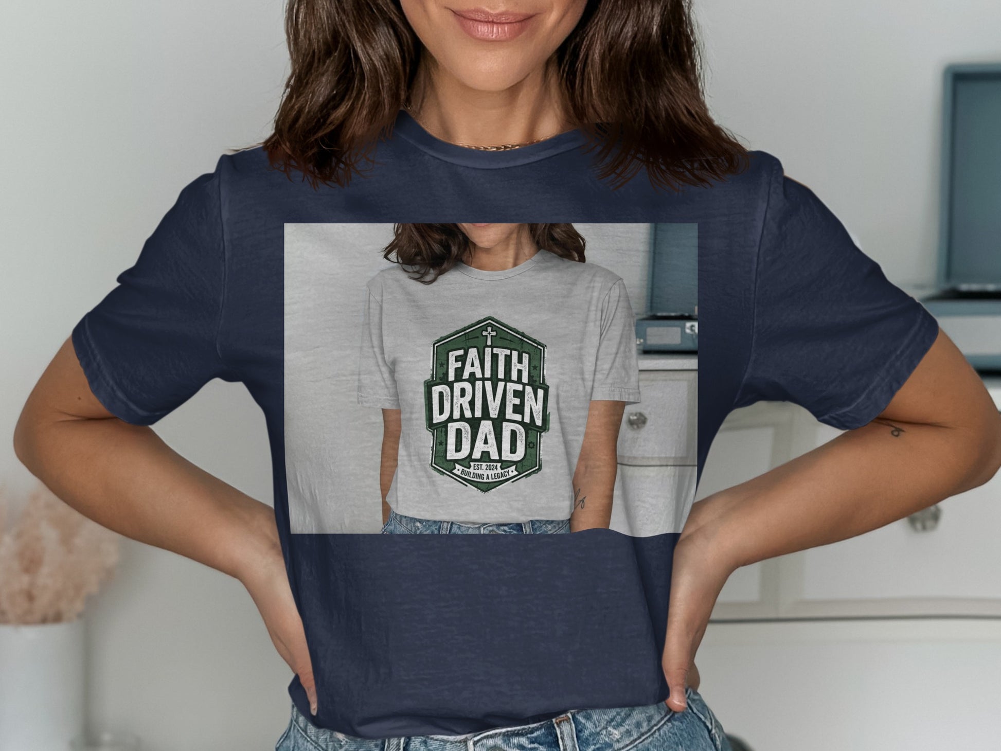 Navy t-shirt with "Faith Driven" text and a shield graphic.