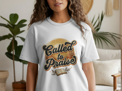 White t-shirt with "Called to Praise" text and open book graphic.