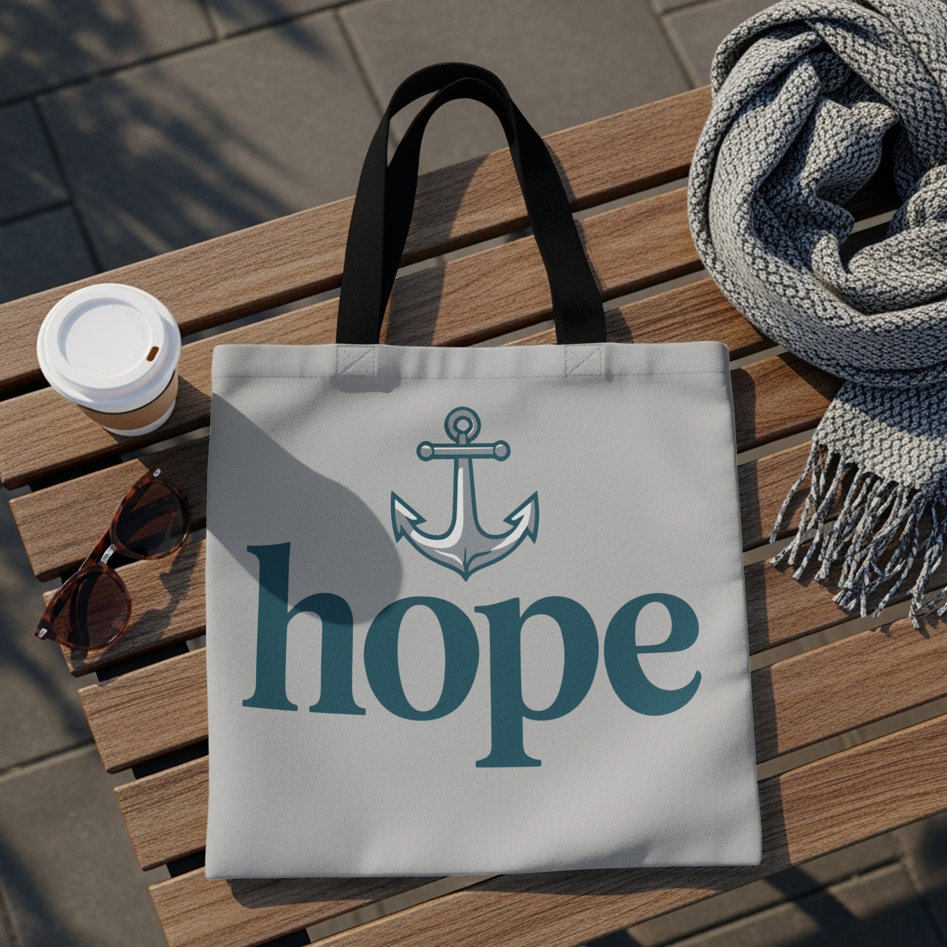 Tote bag with anchor and "hope" text on light gray background.