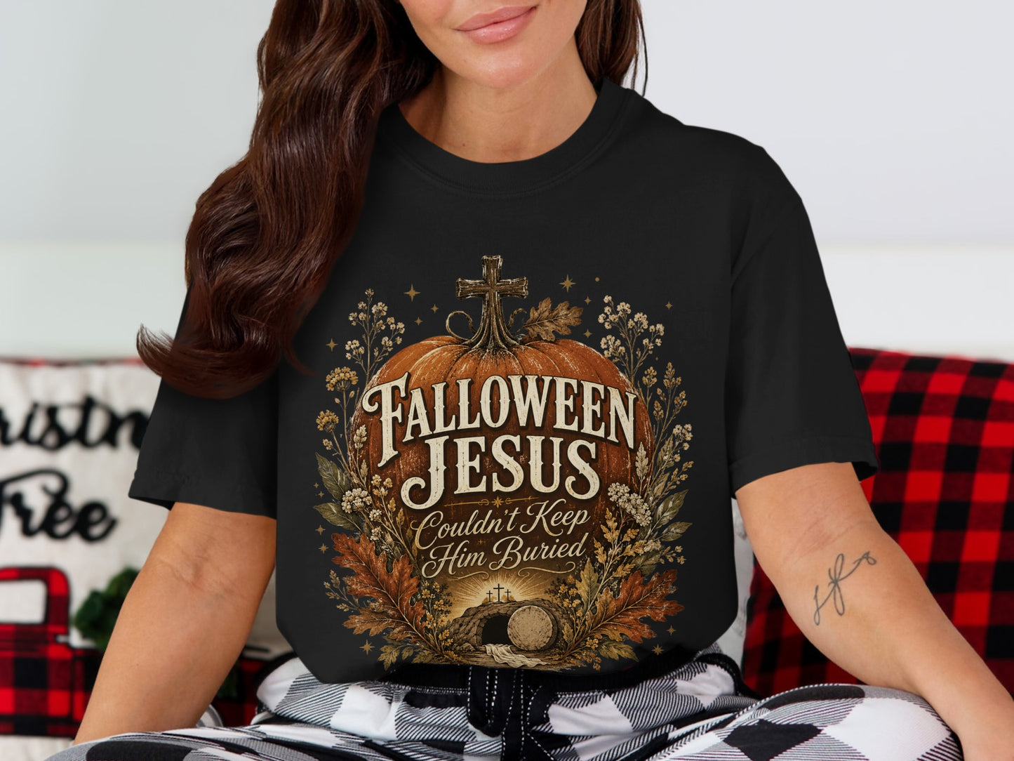 Black t-shirt with graphic: "Falloween Jesus Couldn't Keep Him Buried" and tomb scene.