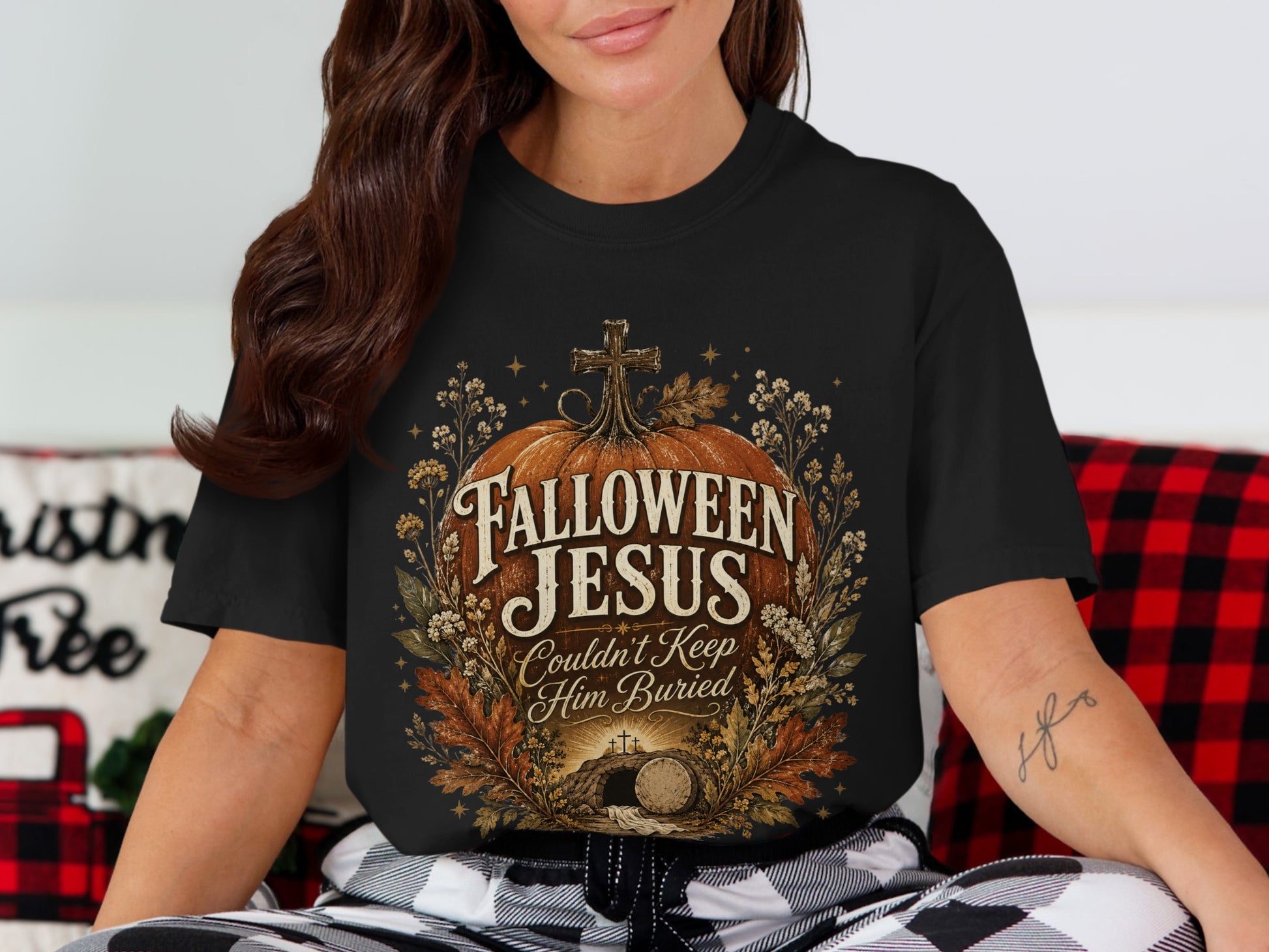 Black t-shirt with graphic: "Falloween Jesus Couldn't Keep Him Buried" and tomb scene.