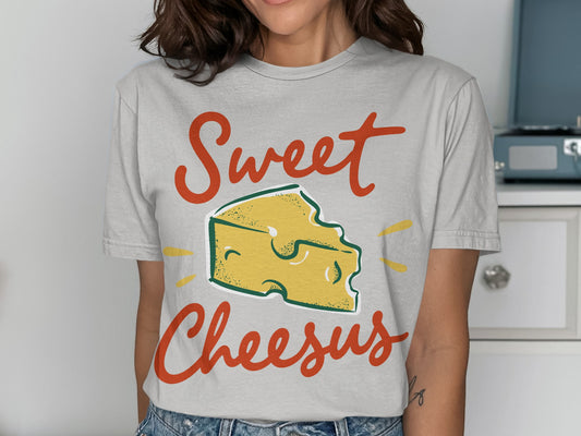 T-shirt with "Sweet Cheesus" text and slice of cheese graphic.