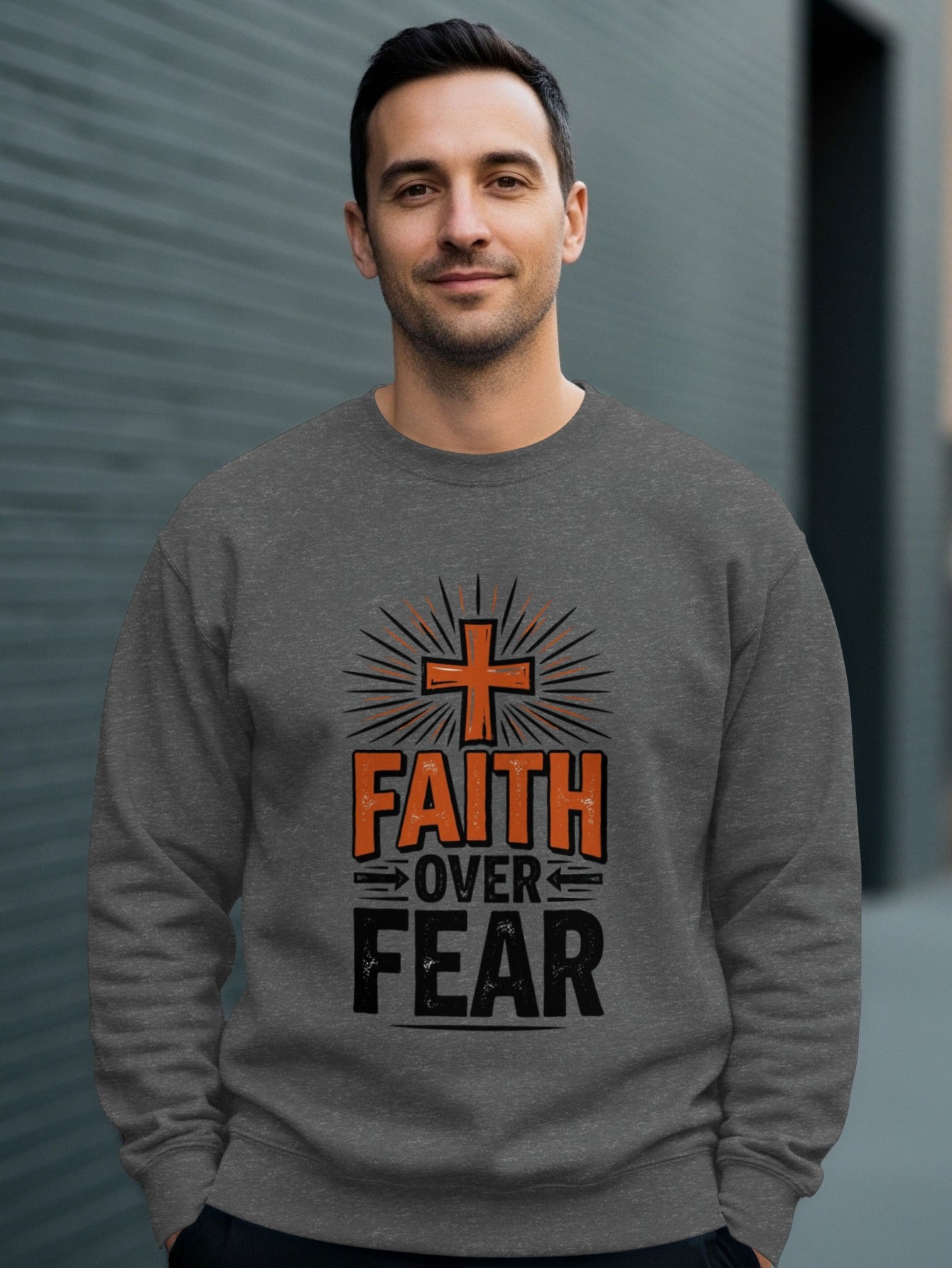 Gray sweatshirt with "FAITH OVER FEAR" text and a cross graphic.