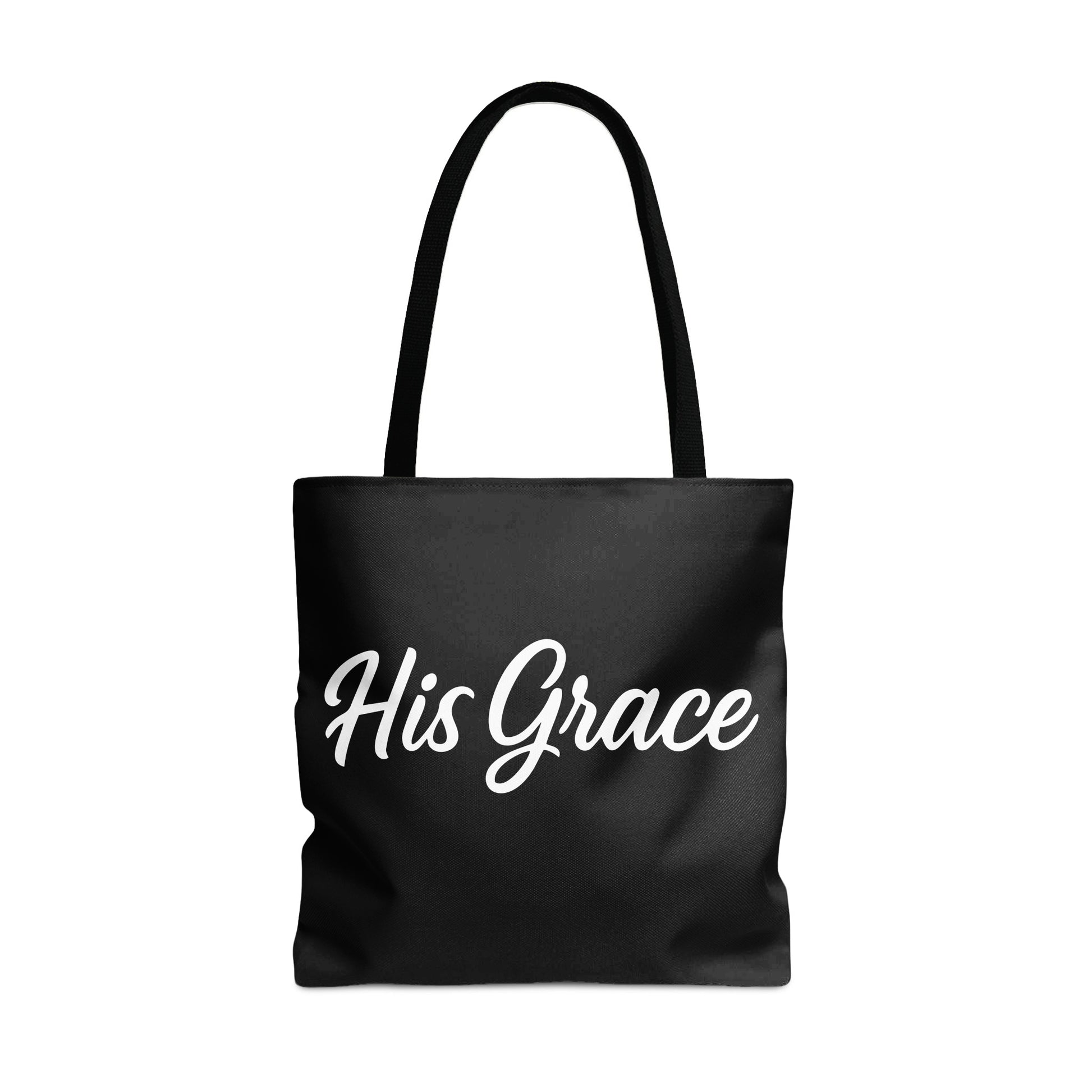 Black tote bag with white "His Grace" text and black handles.