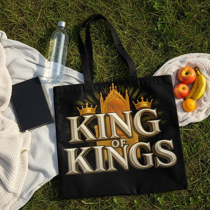 Black tote bag with "KING OF KINGS" text and golden throne design.