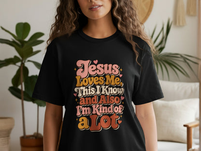 Black t-shirt with retro text: Jesus Loves Me, This I Know and Also I'm Kind of a Lot.