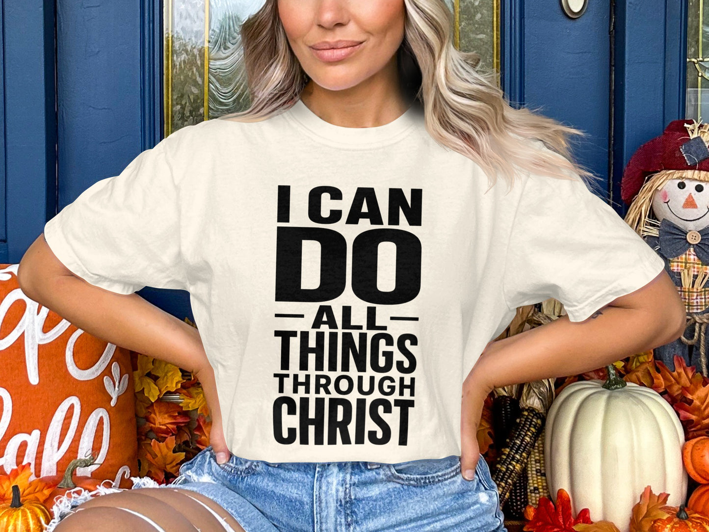 Cream t-shirt with black text "I CAN DO ALL THINGS THROUGH CHRIST".