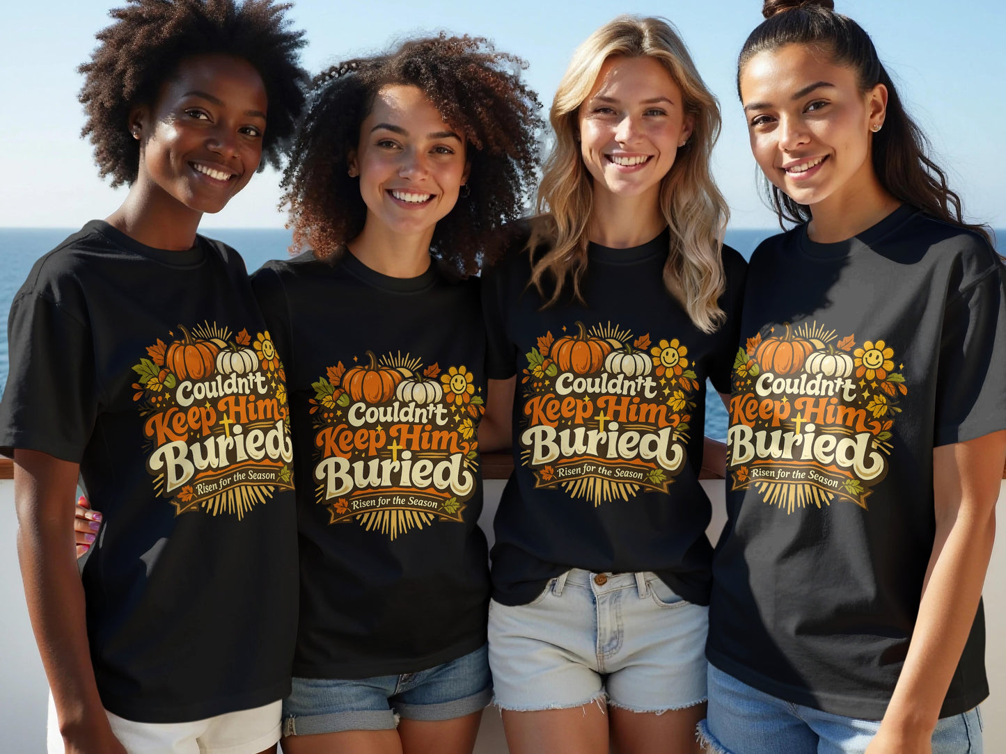 Four women in black t-shirts with "Couldn't Keep Him Buried" autumn graphic.