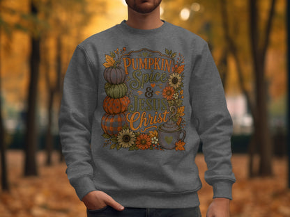 Gray sweatshirt with "Pumpkin Spice & Jesus Christ" text and autumn graphics.
