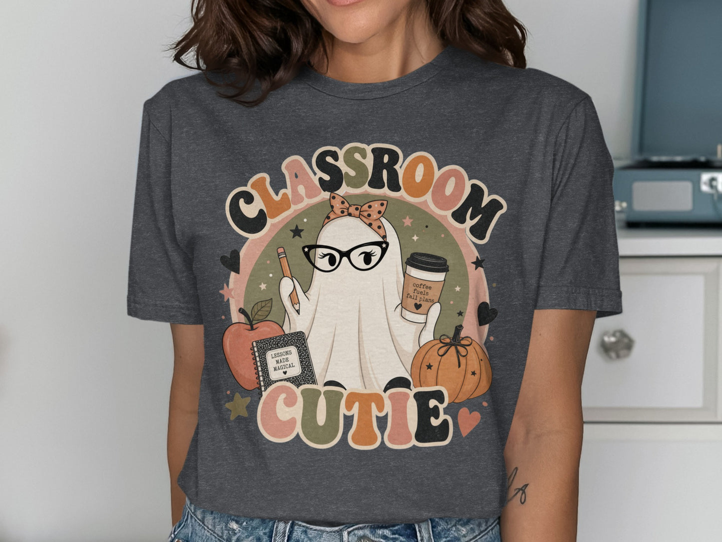Ghost wearing glasses and holding coffee cup on t-shirt with text Classroom Cutie.