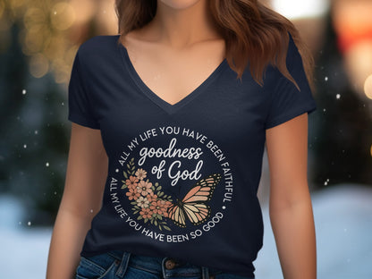 Navy v-neck t-shirt with "goodness of God" and butterfly design.