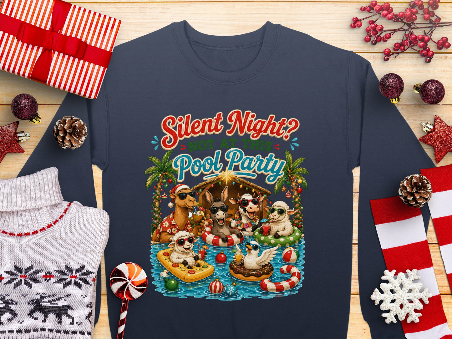 Christmas crew in pool with "Silent Night? Pool Party" text.