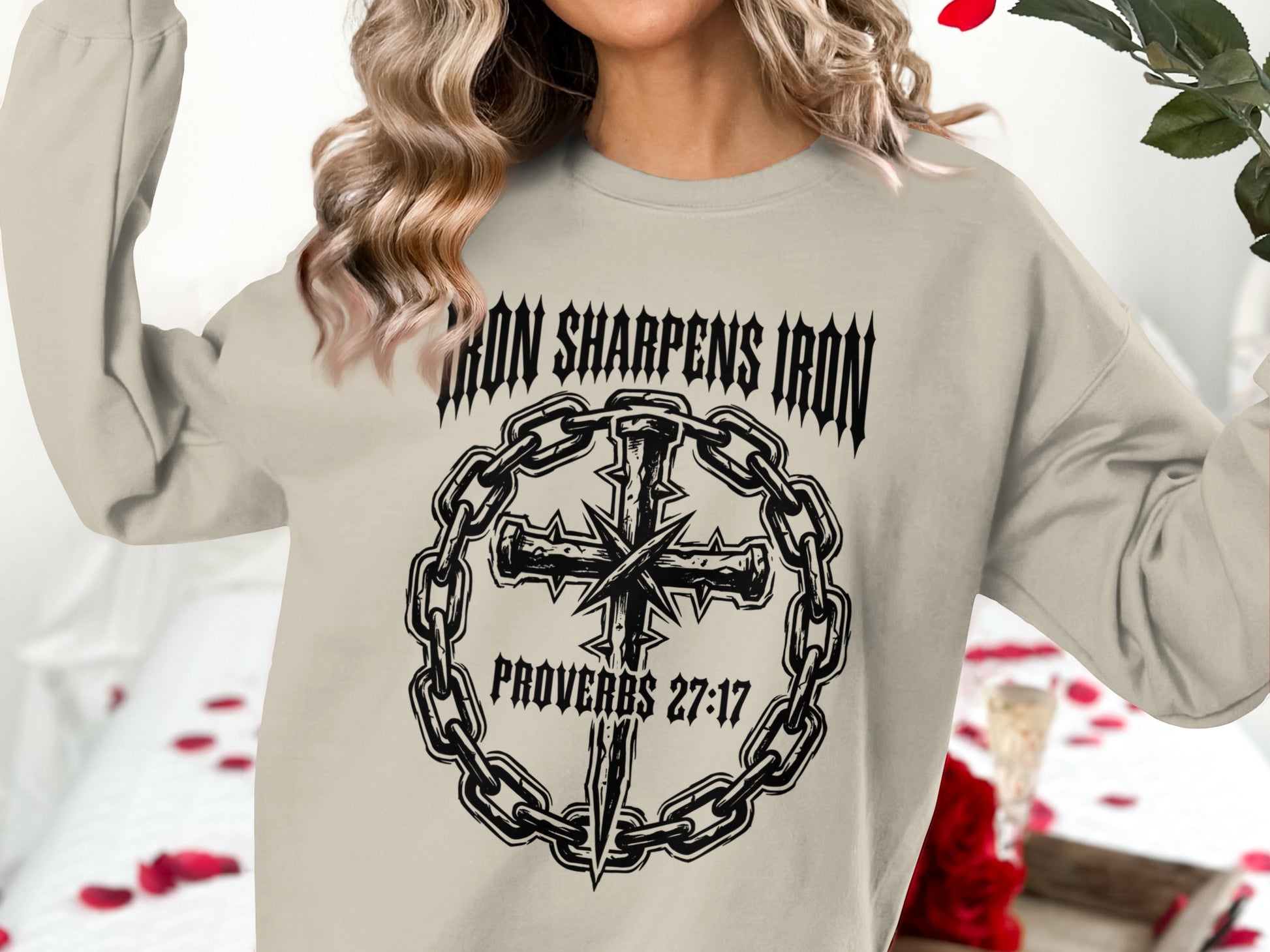 Crewneck sweatshirt with "Iron Sharpens Iron" and a cross within a chain.