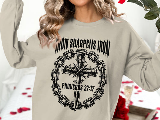Crewneck sweatshirt with "Iron Sharpens Iron" and a cross within a chain.