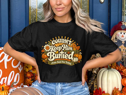 Black t-shirt with "Couldn't Keep Him Buried" and "Jesus Said Not Today" design.