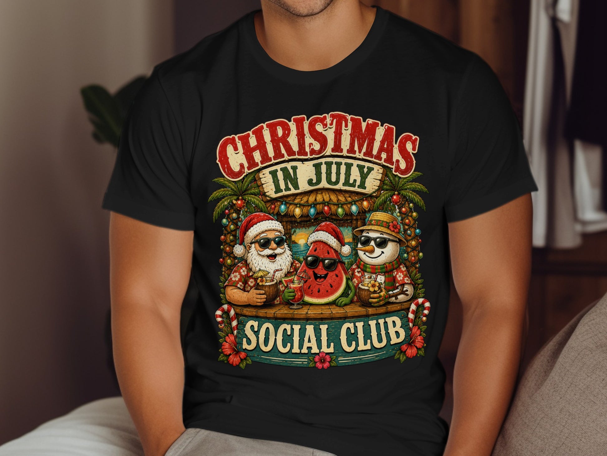 Christmas in July Social Club graphic on a black t-shirt.