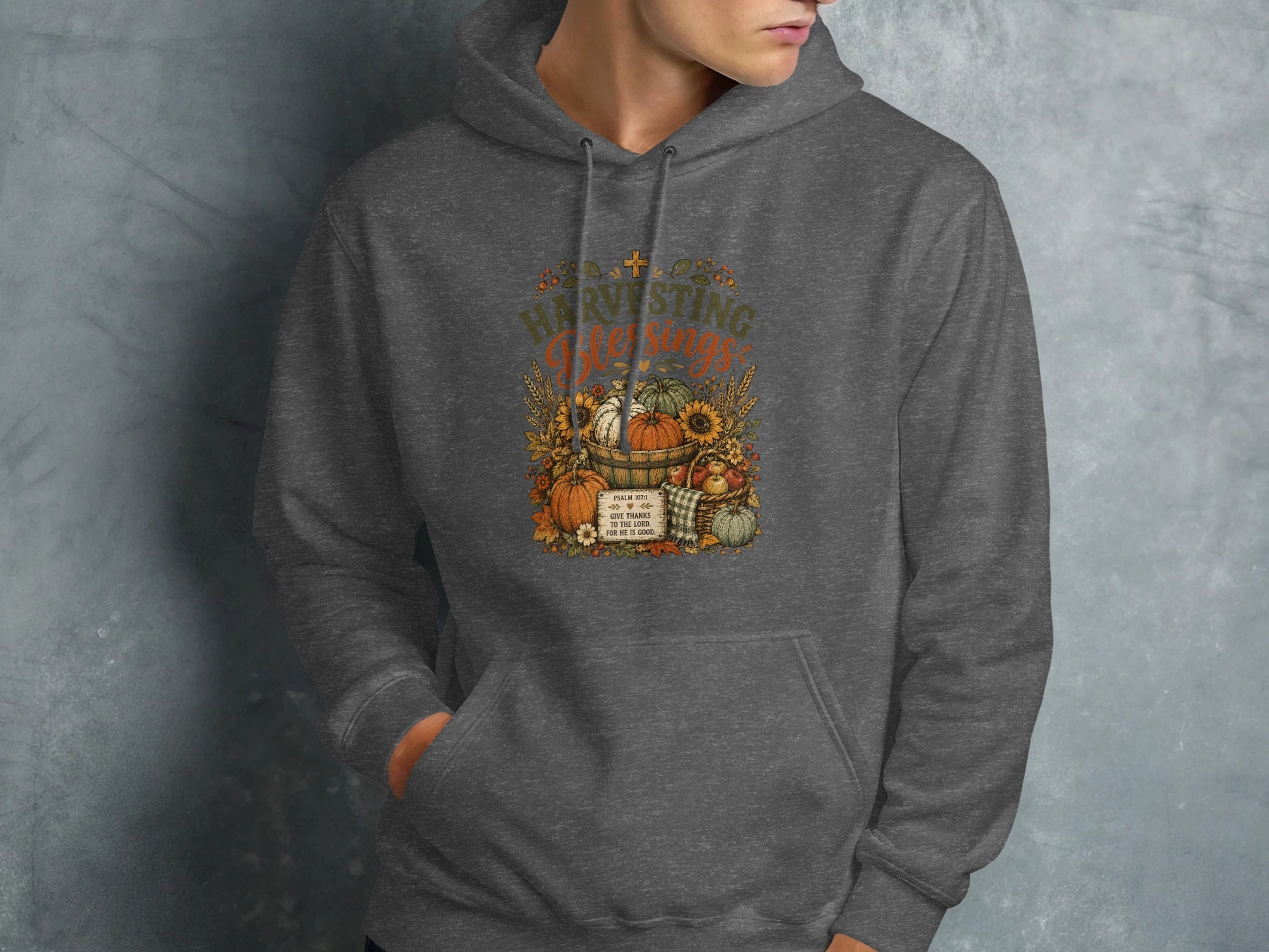 Dark gray hoodie with fall harvest graphic and Bible verse.