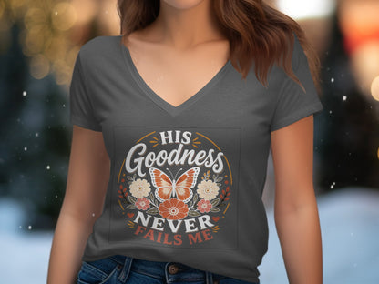 Dark grey t-shirt with "His Goodness Never Fails Me" text and butterfly graphic.