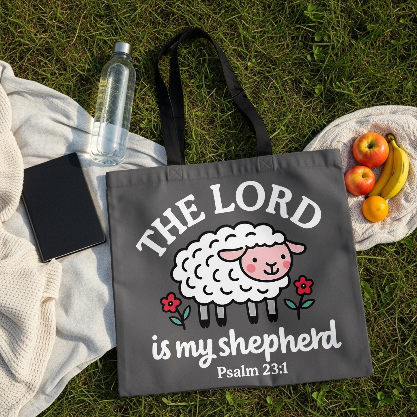 Dark gray tote bag with a sheep graphic and "The Lord is my shepherd Psalm 23:1" text.