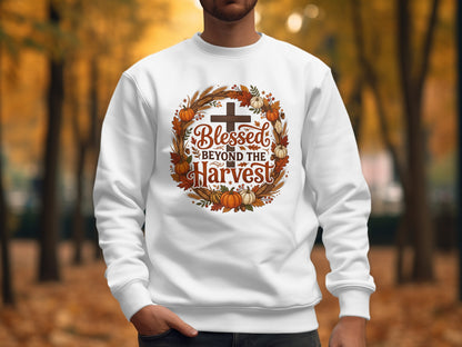 White sweatshirt with "Blessed Beyond the Harvest" and autumn wreath.