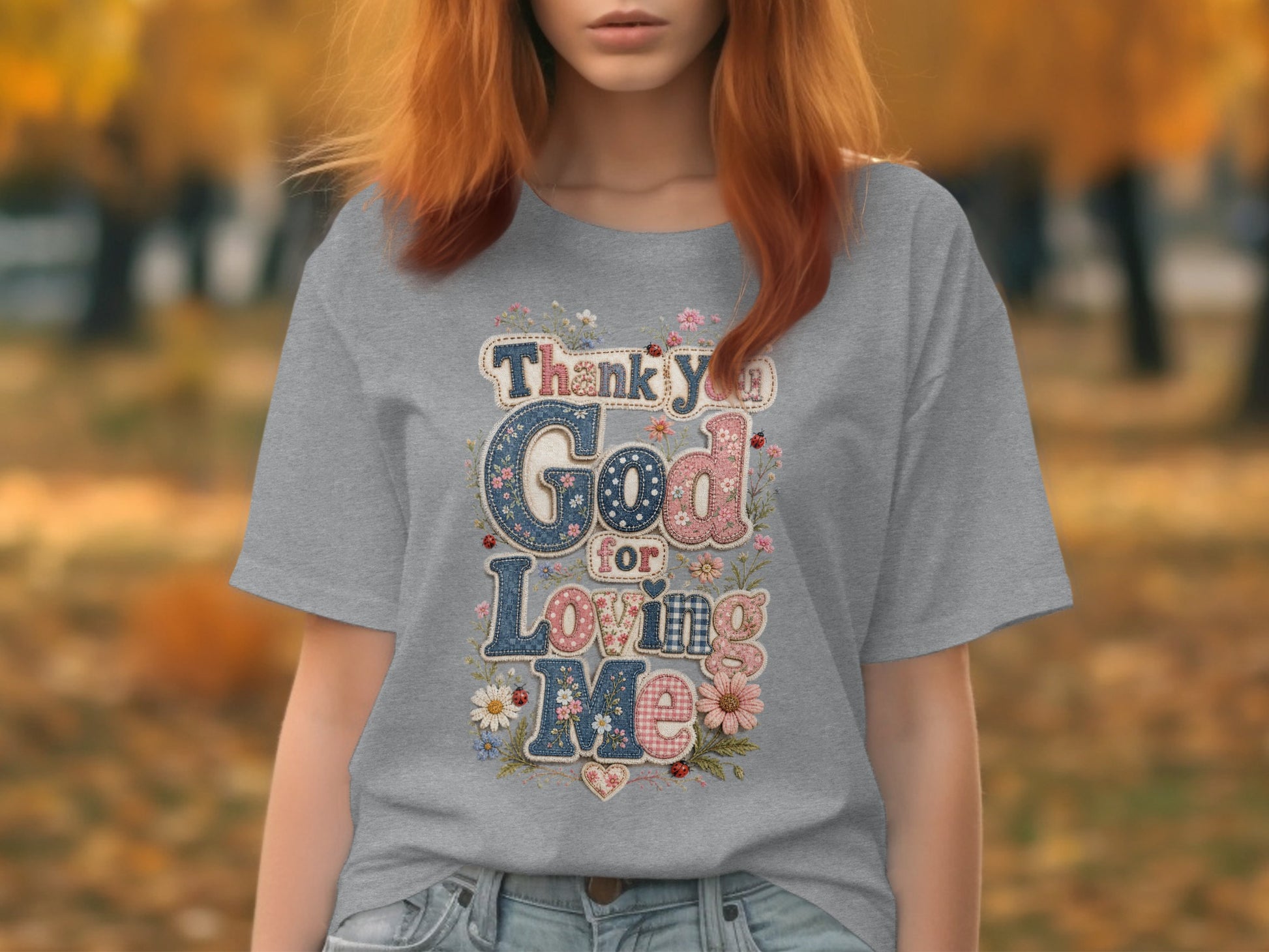 Gray t-shirt with "Thank You God For Loving Me" text and floral accents.