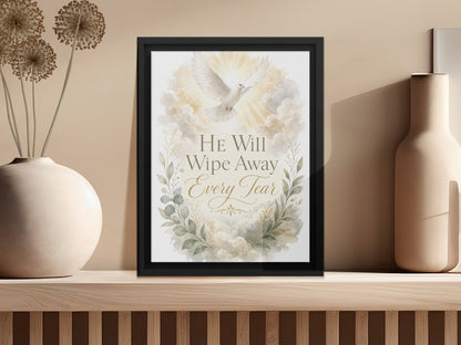 Framed artwork with dove and text "He Will Wipe Away Every Tear" amidst clouds.
