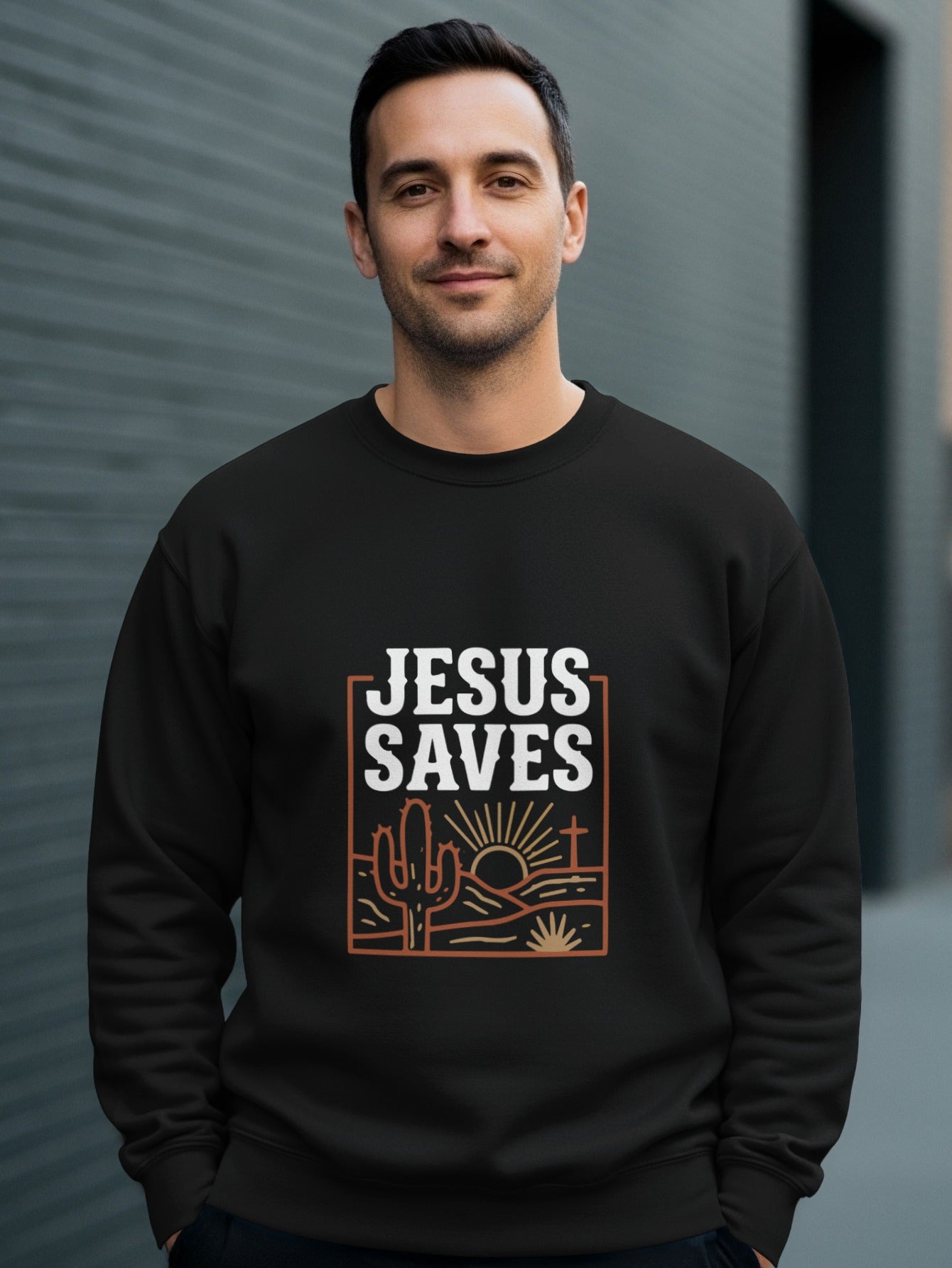 Black sweatshirt with "Jesus Saves" and desert sunset graphic.