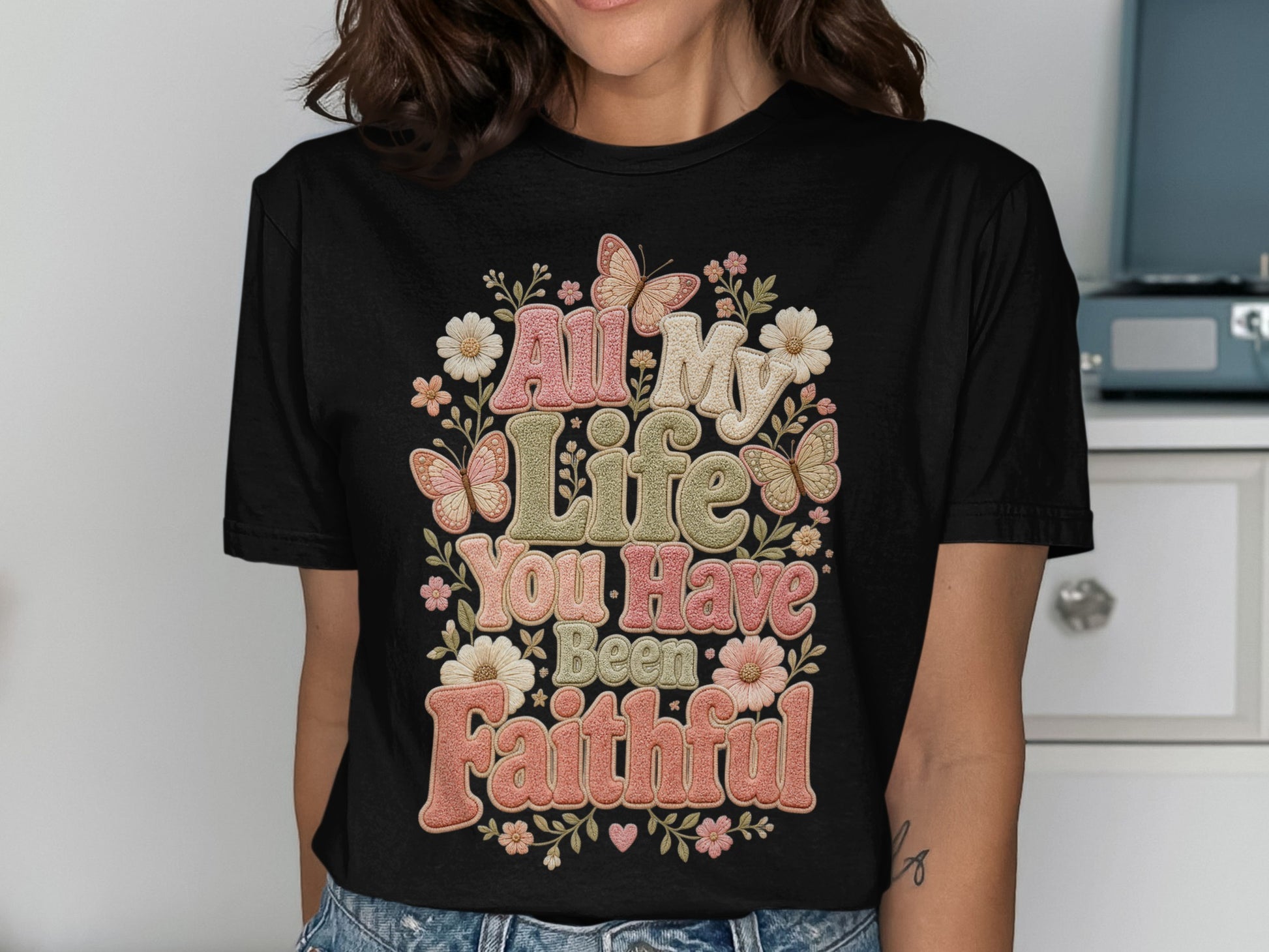 Black t-shirt with "All My Life You Have Been Faithful" text and floral butterfly design.
