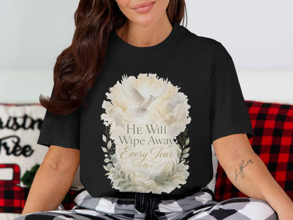 Black t-shirt with white dove and floral wreath, text "He Will Wipe Away Every Tear".