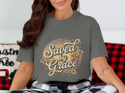 Grey t-shirt with "Saved by Grace" graphic featuring a cross and flowers.