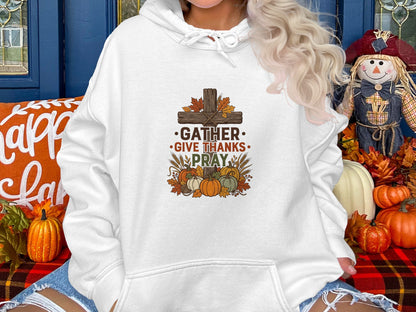 White hoodie with fall harvest graphic and "Gather, Give Thanks, Pray" text.