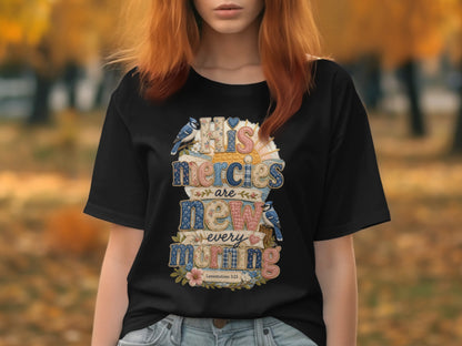 Black t-shirt with "His mercies are new every morning" text and floral design.