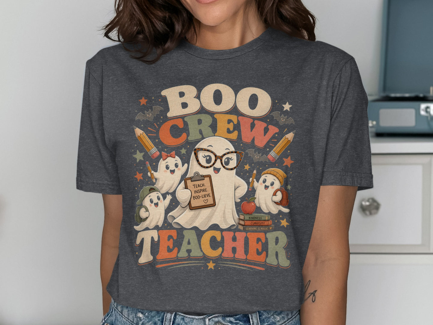 "Boo Crew Teacher" graphic with cute ghosts, pencils, and books.