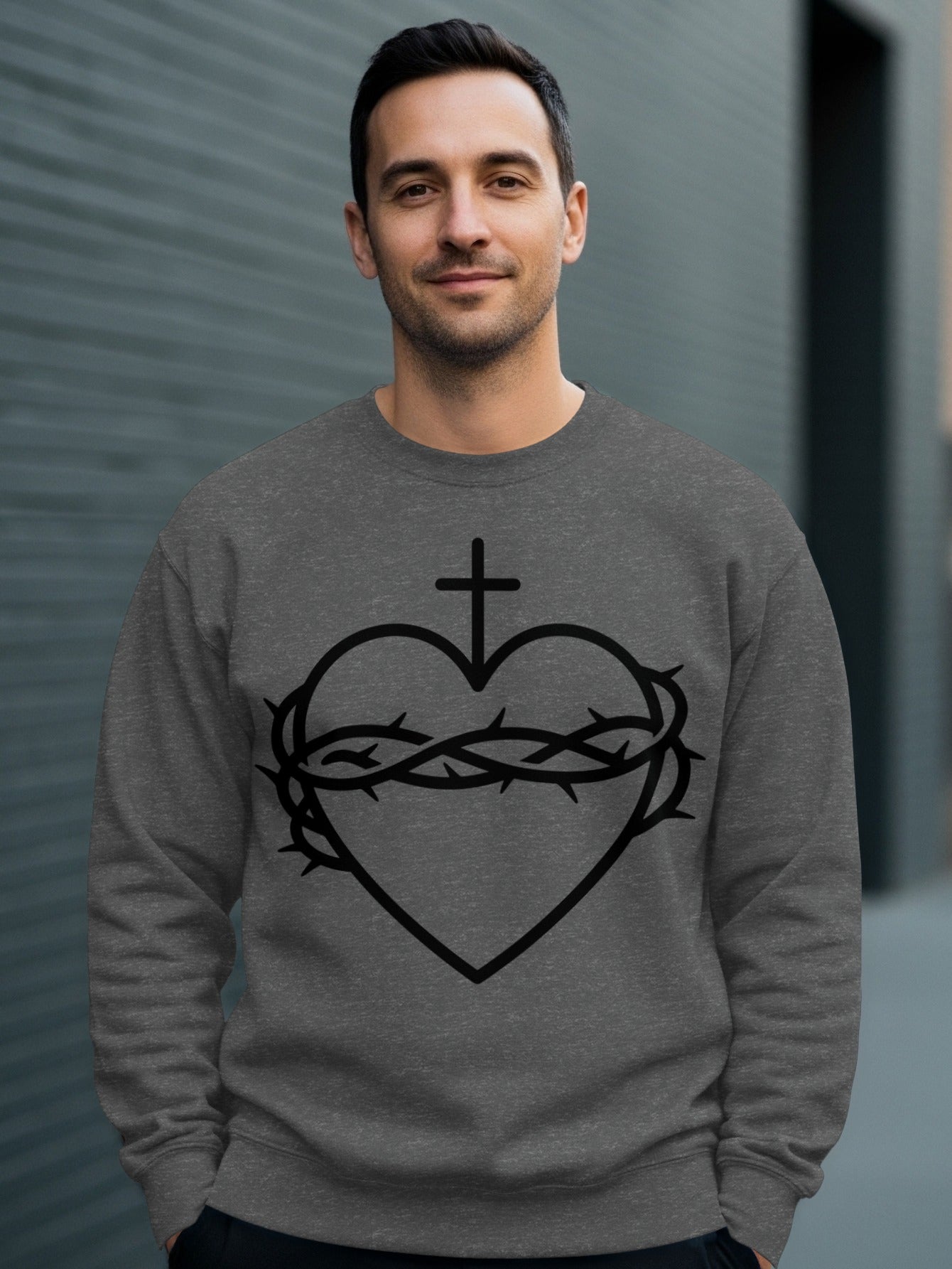 Dark grey sweatshirt with black Sacred Heart of Jesus graphic.