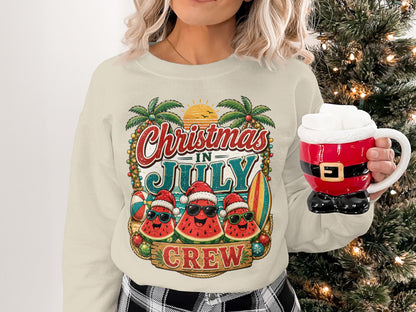 Crewneck sweatshirt with "Christmas in July Crew" design featuring sunglasses-wearing watermelons.