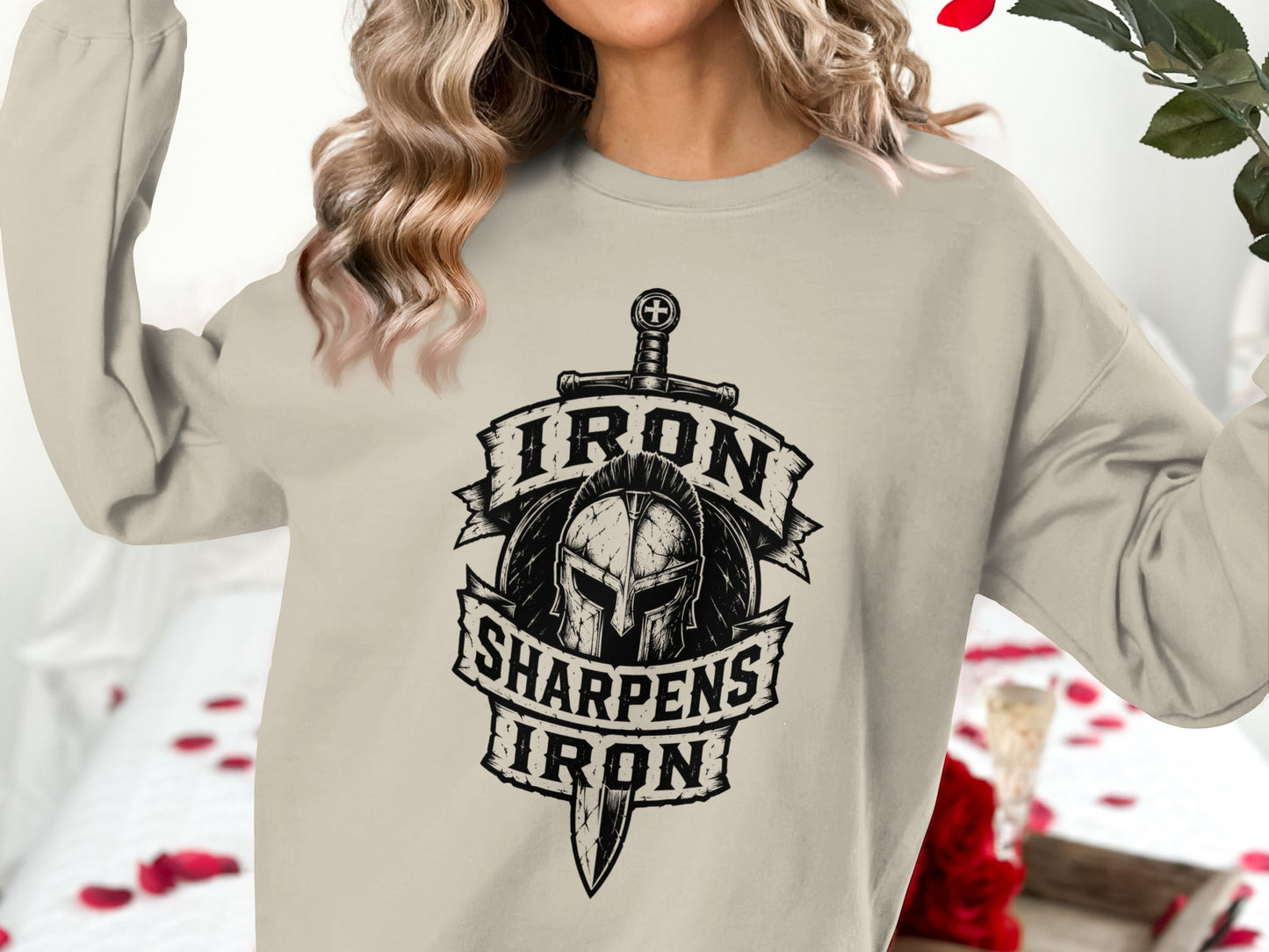 Crewneck sweatshirt with a Roman helmet, sword, and banner reading "Iron Sharpens Iron".