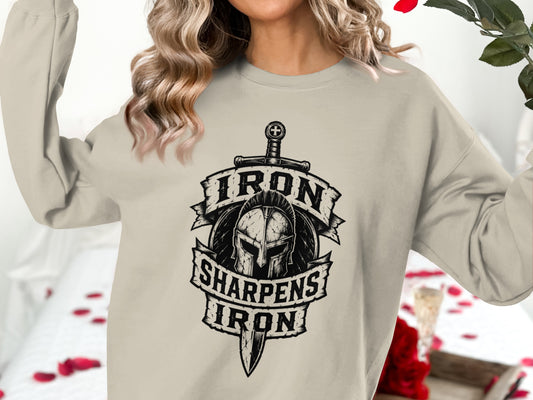 Crewneck sweatshirt with a Roman helmet, sword, and banner reading "Iron Sharpens Iron".