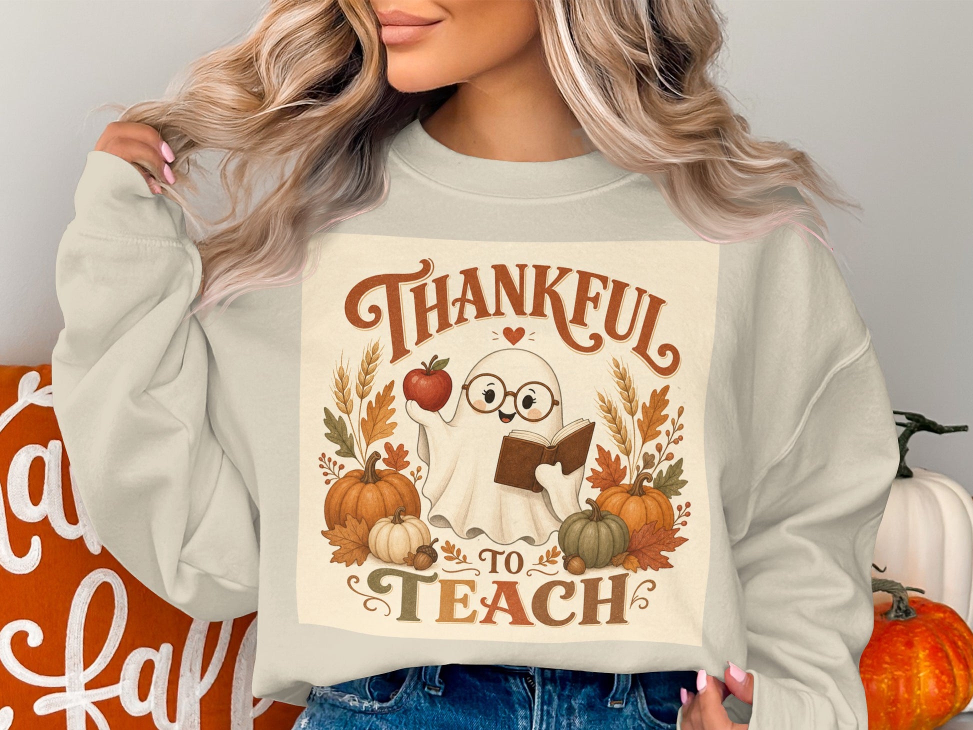 Ghost wearing glasses holding an apple and book, "Thankful To Teach" text.