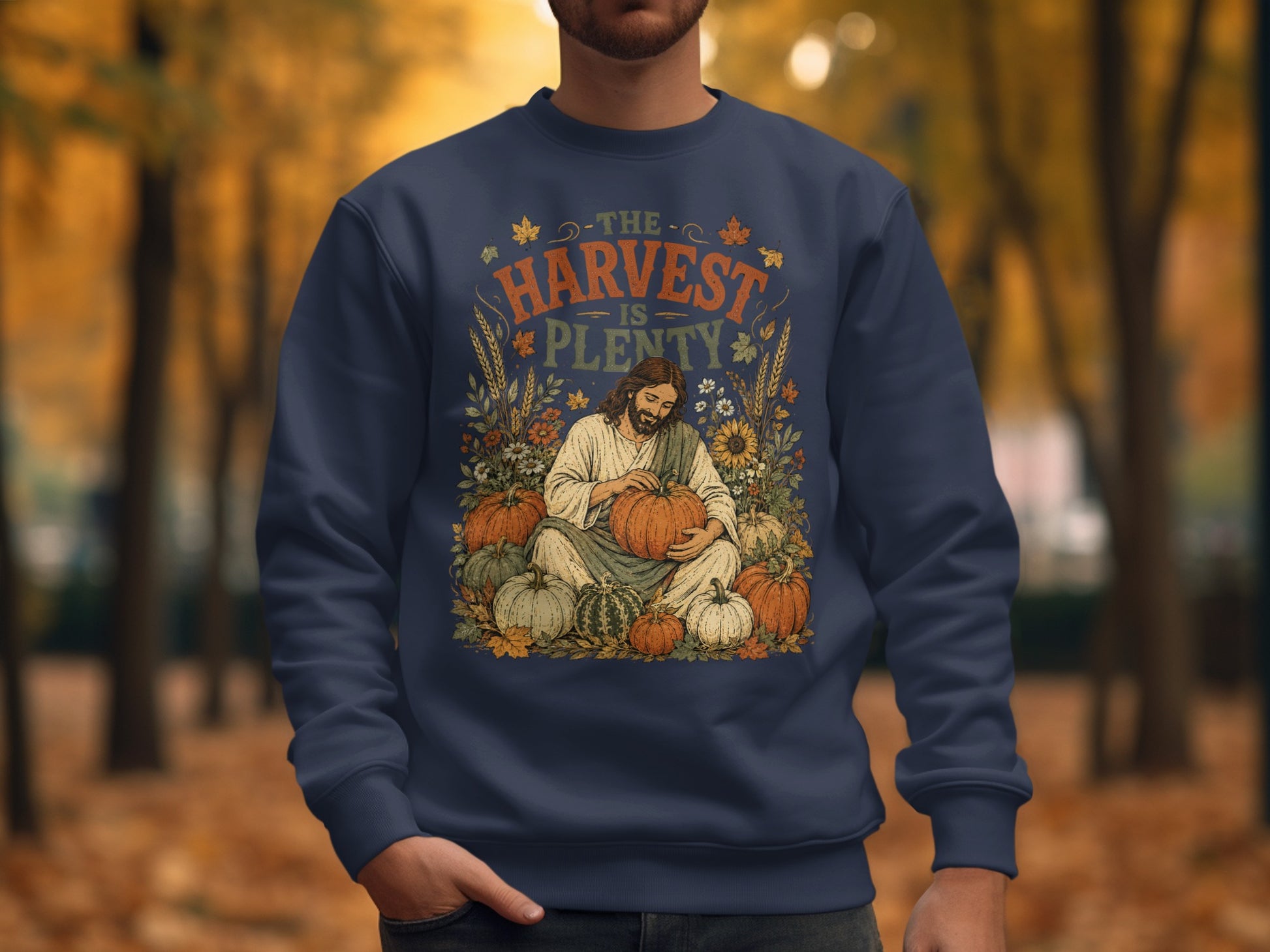 Jesus holding a pumpkin, surrounded by harvest vegetables and text "The Harvest is Plenty."