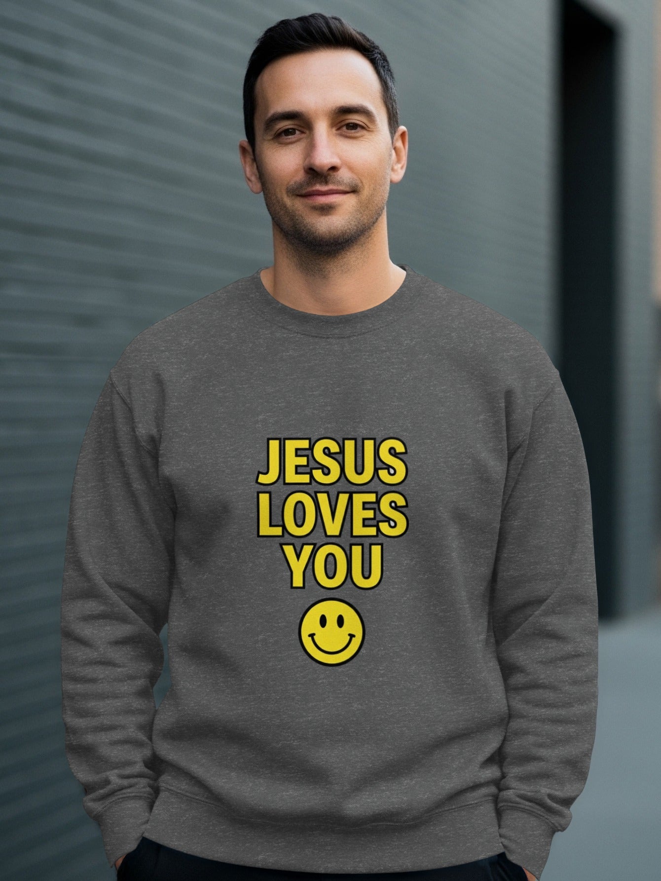 Grey sweatshirt with "JESUS LOVES YOU" and a yellow smiley face.