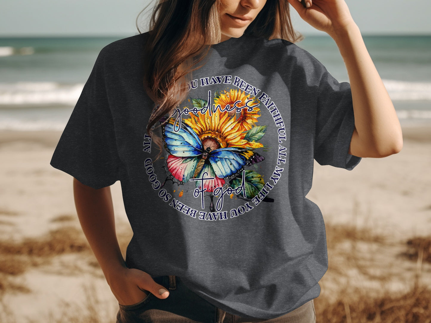 Dark t-shirt with butterfly, sunflower, and inspirational text.