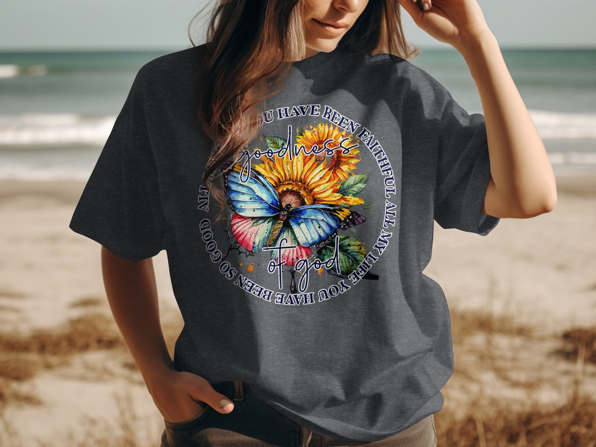 Dark t-shirt with butterfly, sunflower, and inspirational text.