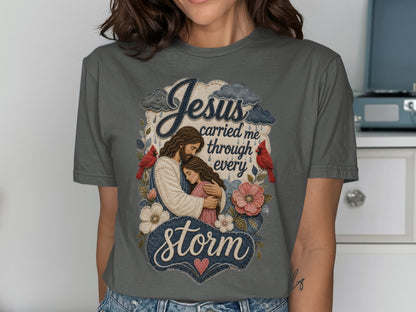 Jesus carrying a girl through a storm, with text "Jesus carried me through every storm".