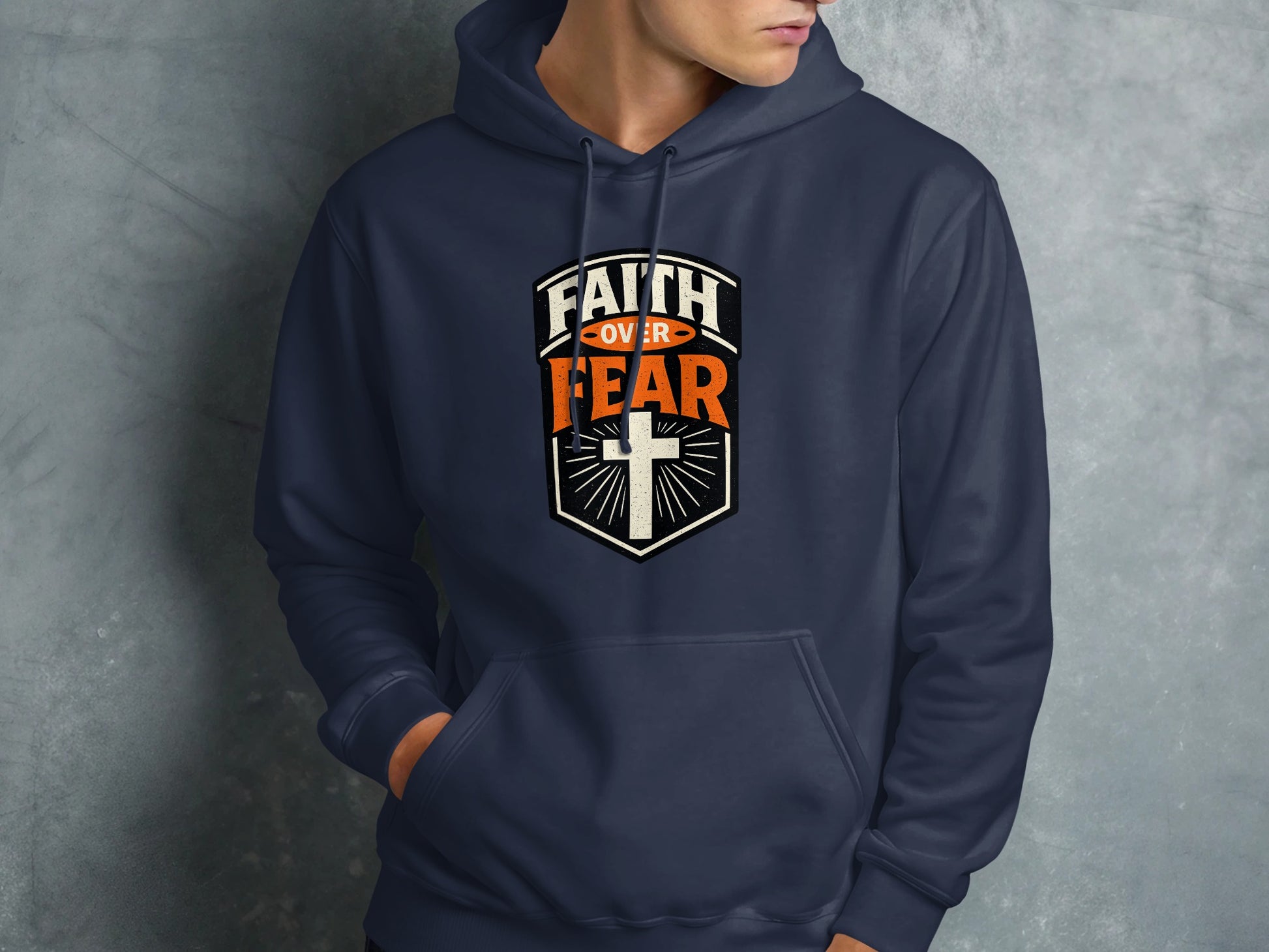 Navy blue hooded sweatshirt with "FAITH OVER FEAR" and cross graphic.