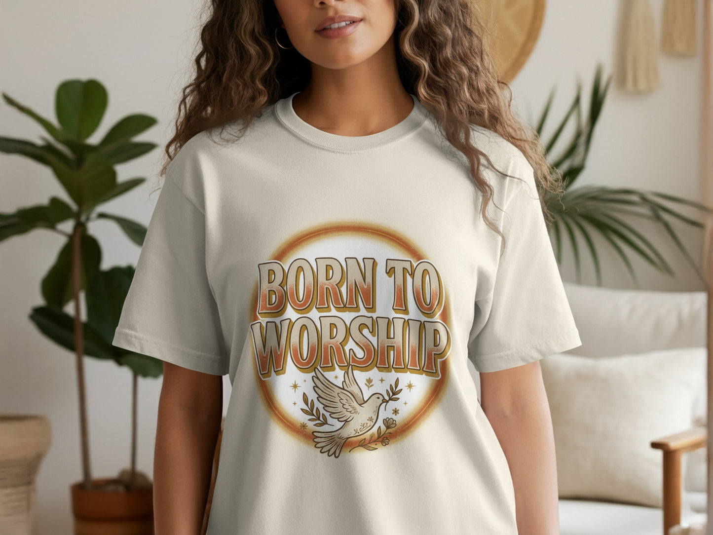 Light beige t-shirt with "Born to Worship" text and a dove with olive branch design.