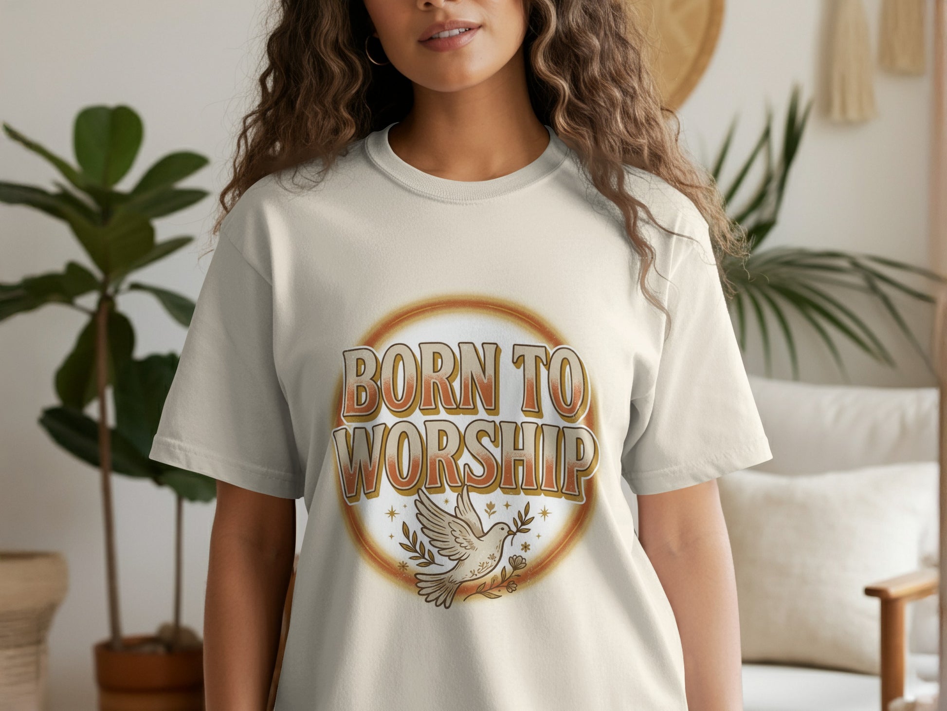 Light beige t-shirt with "Born to Worship" text and a dove with olive branch design.