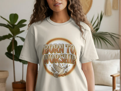 Light beige t-shirt with "Born to Worship" text and a dove with olive branch design.