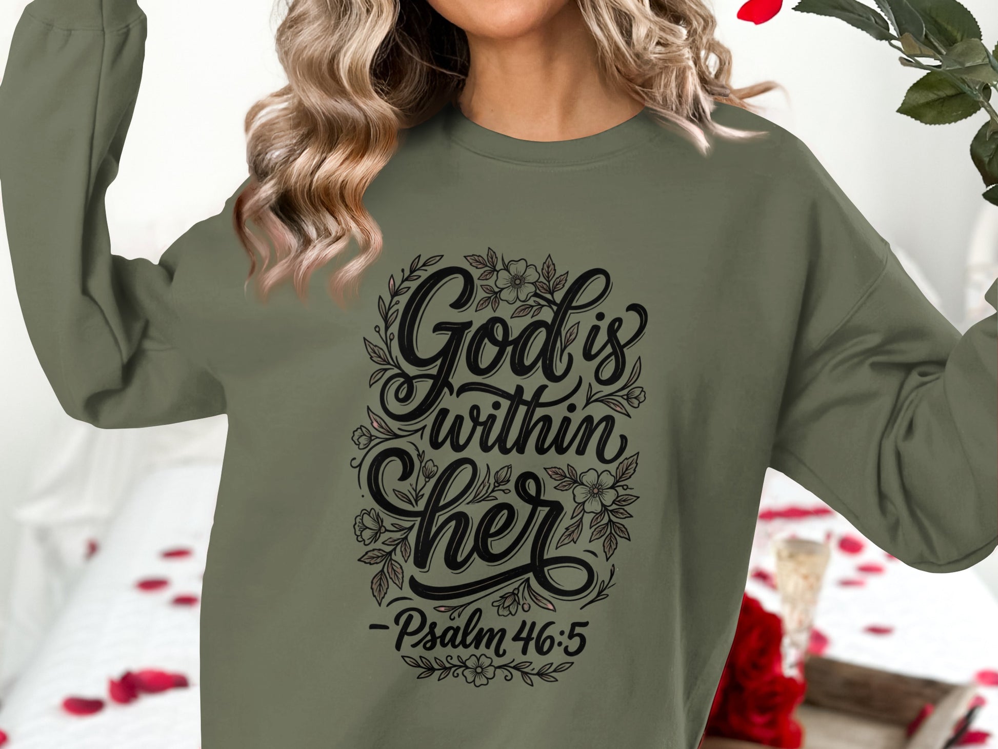 Olive green sweatshirt with "God is within her Psalm 46:5" in floral design.